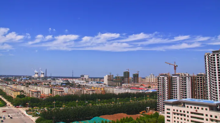 Taocheng District skyline under blue sky