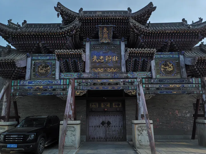 Painted temple gate with double eaves in Dai County