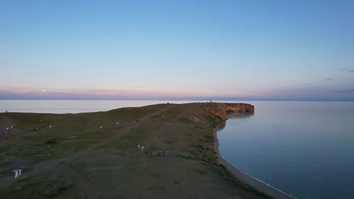 Aerial dusk view of a cliff point on Lake Hulun, New Barag Right Banner