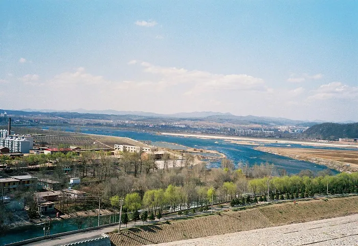 River and townscape view near Dongzhou District, Fushun