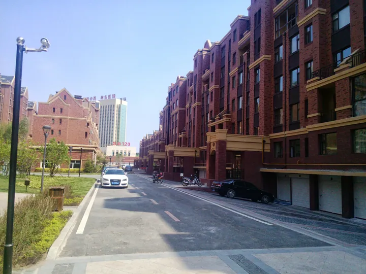 New apartment buildings along a clean residential street in Ningjiang District