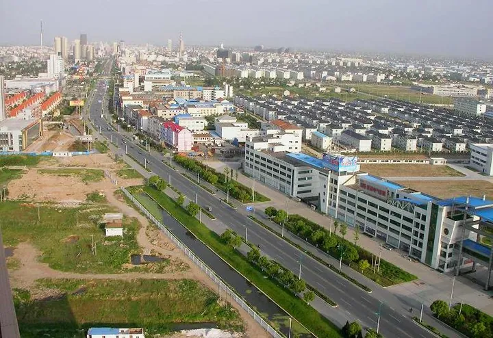 Aerial view of streets and buildings in downtown Qidong