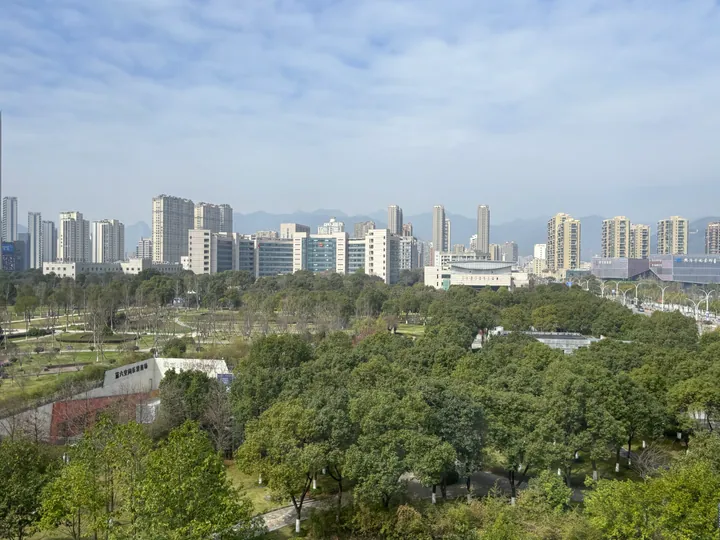 Skyline view over Citizen Park with government buildings in Yueqing