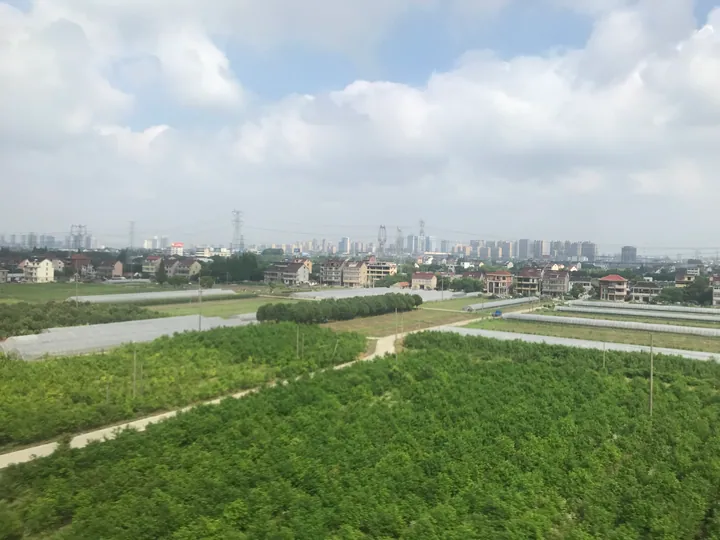 Farmland and skyline of Jiashan County