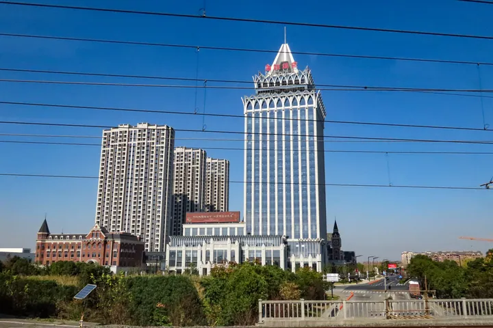 Distinctive tower building with a turret roof near Tongxiang Railway Station
