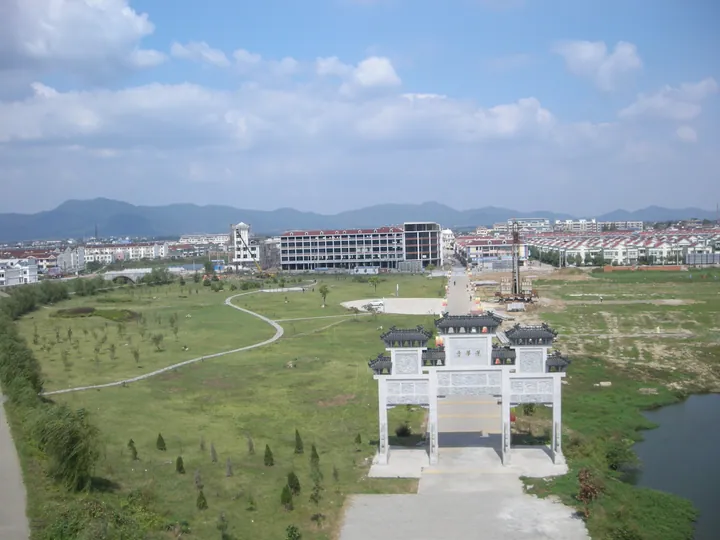 Elevated view of Bowang town with a memorial archway