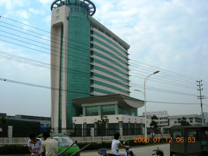 Distinctive green-glass office tower, the Quanchai Building, in Quanjiao County