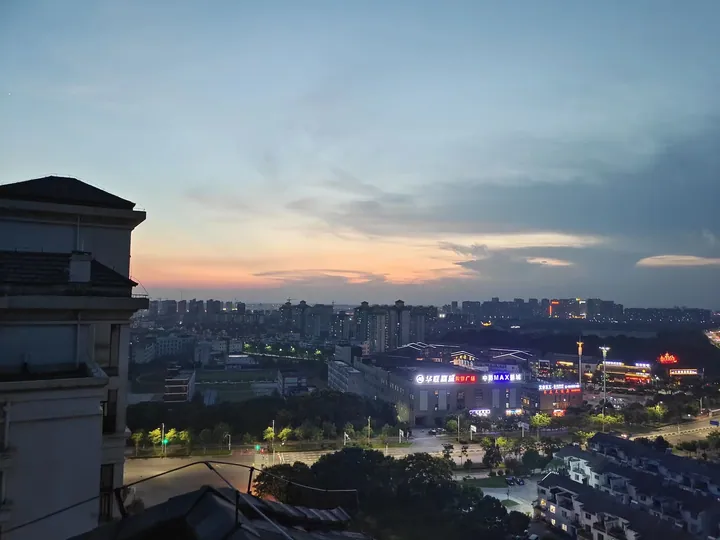 City skyline of Guichi District with illuminated buildings at dusk