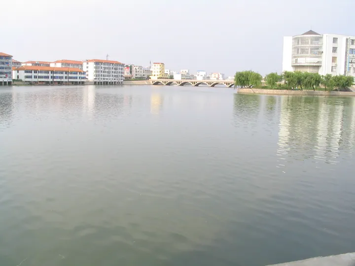 River confluence with buildings in Wendeng District