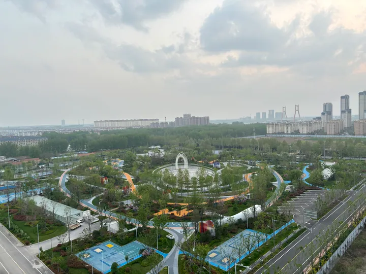 Landscaped park with paths and greenery seen from above in Hedong District, Linyi