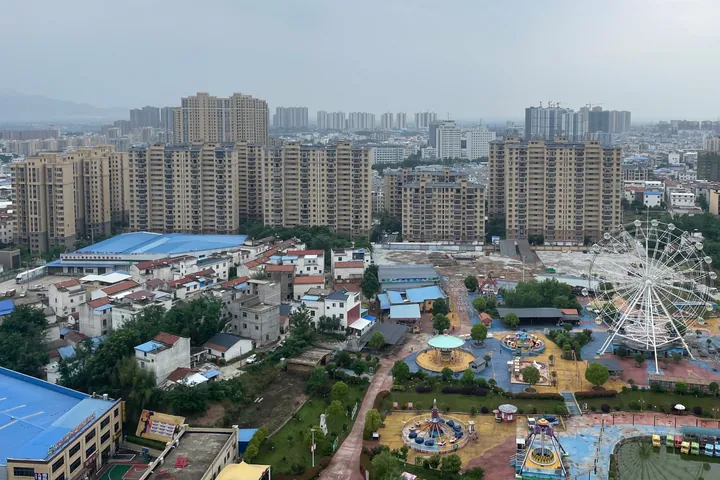 City view of Macheng with an amusement park in the foreground