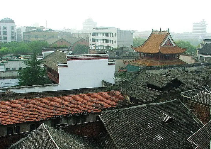 Old town rooftops with a temple hall roof, Yuhu District, Xiangtan