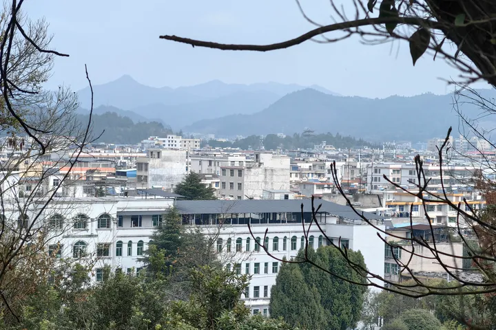 Townscape of Rucheng County viewed from a hillside cemetery overlook