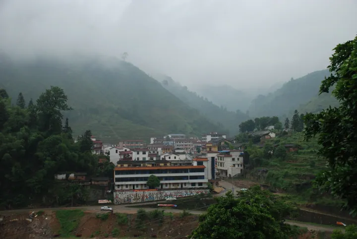 A mountain village shrouded in mist in Ruyuan Yao Autonomous County