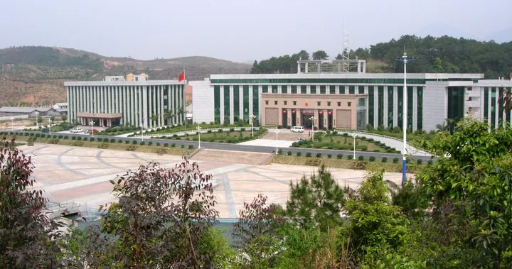 Modern government office building with landscaped grounds in Fogang County