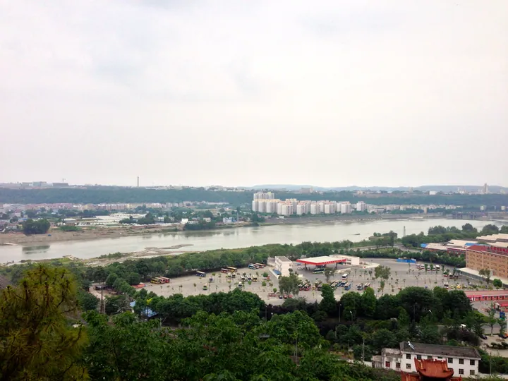 Elevated view of a river and city skyline in Fucheng District, Mianyang