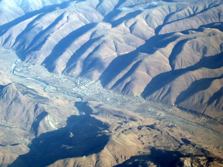 Aerial view of Daofu (Dawu) County seat in a mountain valley