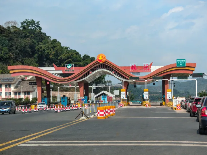 Colorful arched toll gate marked with the name Zhenyuan on the Tianyou Expressway