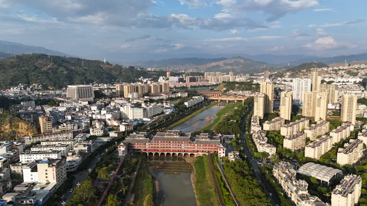 Aerial cityscape of Yunxian along the Luozha River
