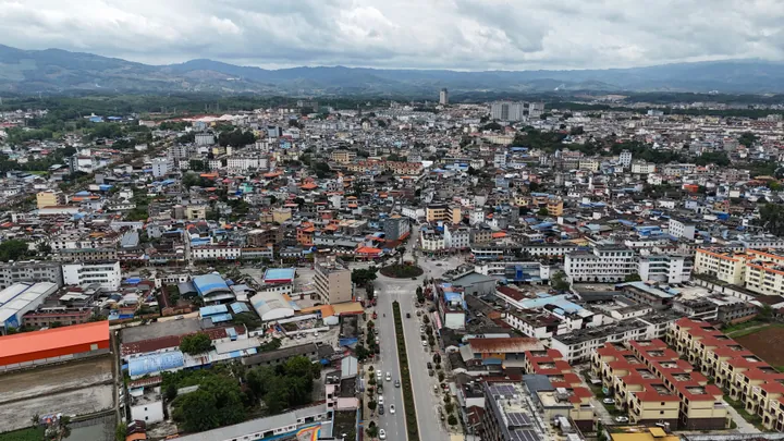 Aerial cityscape of Longchuan with its old town in the foreground