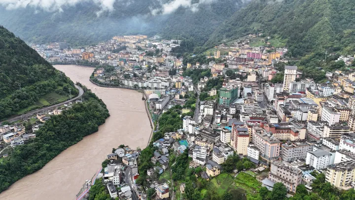 Aerial view of Gongshan county seat in a deep river valley