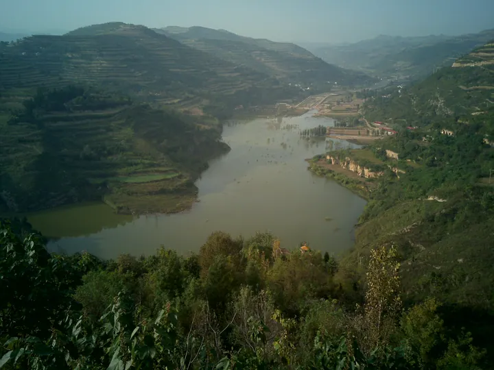 Terraced river valley with a small reservoir in Liuchuanhe Scenic Area