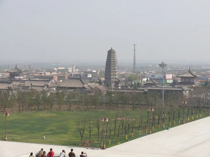 The tall pagoda and temple halls of Famen Temple rising above the town in Fufeng County