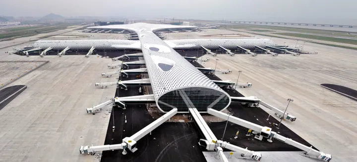 Aerial view of the cross-shaped terminal roof of Shenzhen Bao'an Airport