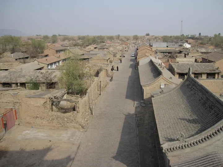 Rooftop view over the historic walled post-station town of Jimingyi