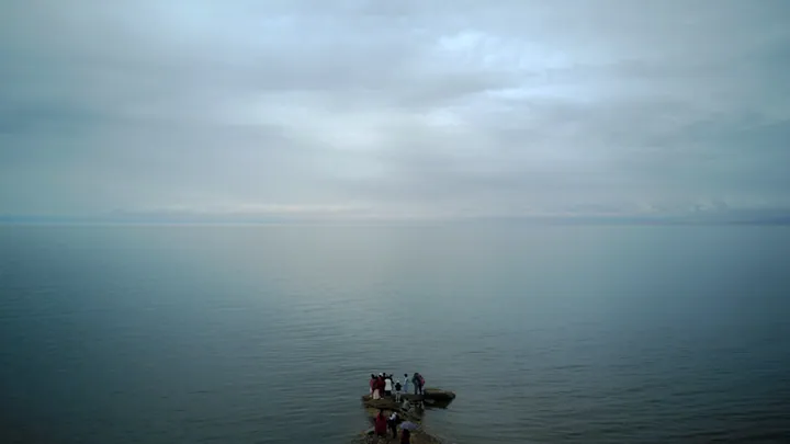 Overcast view across the open water of Qinghai Lake