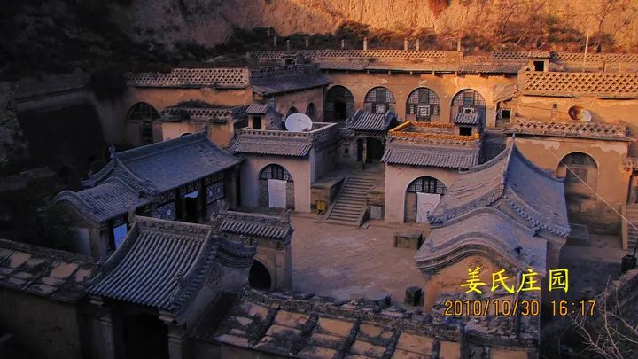 Overview of the terraced loess cave-dwelling manor complex at sunset