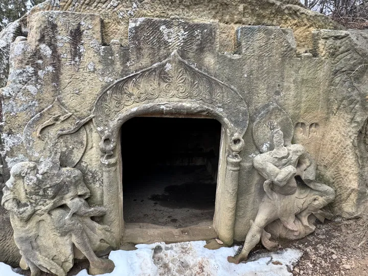 Carved grotto entrance with guardian statues at Yangtoushan Grottoes