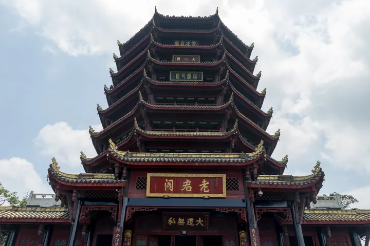 Multi-tiered red pagoda-style Laojun Tower on Mount Qingcheng