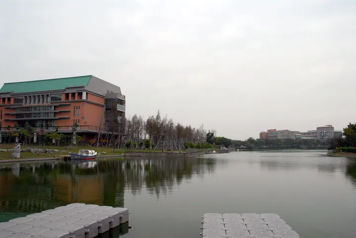 Lake and campus buildings of MingDao University in Pitou Township