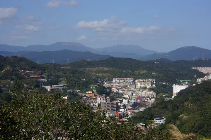 View of Anle District nestled among hills in Keelung