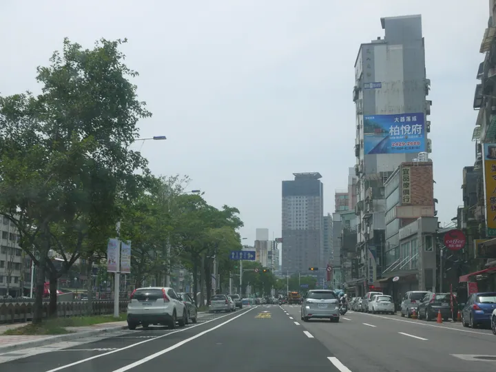 City street with high-rise buildings in Xinyi District, Keelung