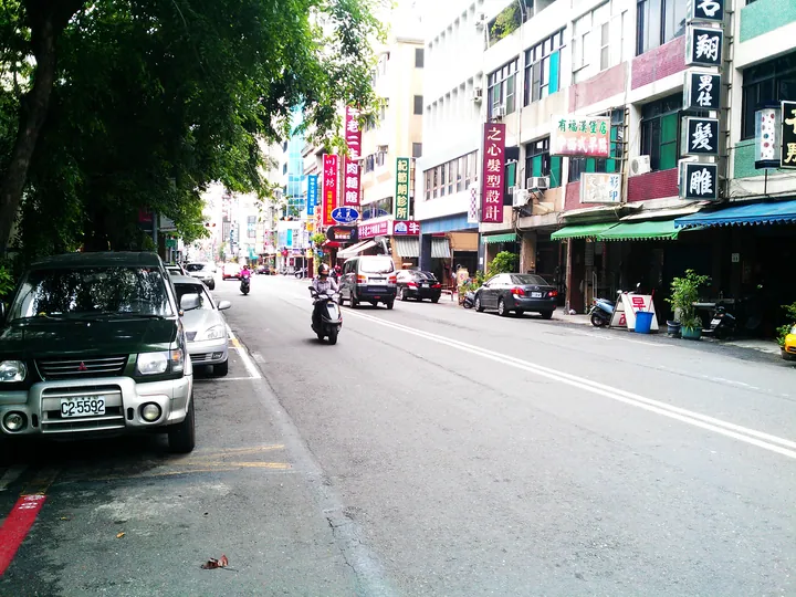 City street lined with shops in Lingya District, Kaohsiung