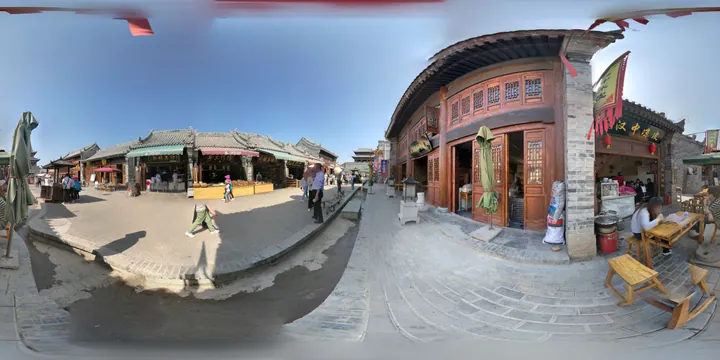 Traditional-style street with shops and pedestrians at Bailuyuan Film City