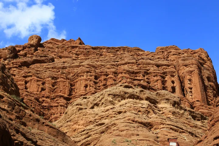 Dramatic eroded red rock formations in the Tianshan Mysterious Grand Canyon
