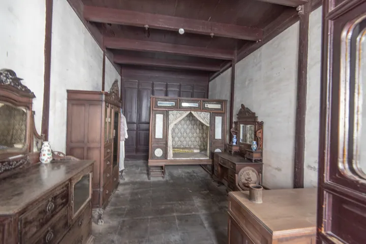 Furnished historic bedroom inside a Qing-dynasty residence