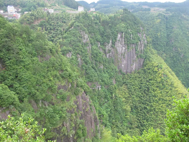 Forested rock cliffs at the Nanjianyan scenic area, Suichang
