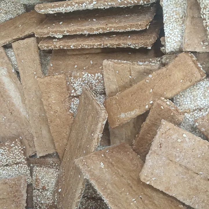 Stacked rectangular sesame-crusted crispy wafer strips